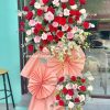 kệ hoa khai trương tone đỏ hồng